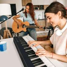 88-Key Folding Electric Piano Keyboard Semi Weighted Full Size MIDI Black - View 3