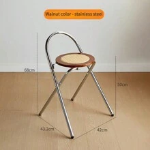Une chaise de dossier pliable en acier inoxydable et rotin, simple et de luxe léger pour petit appartement. Tabouret de salle à manger pratique