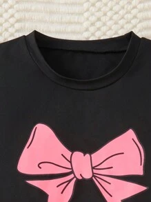 四件套女童优雅休闲睡衣套装，包括蝴蝶结印花吊带背心和粉色短裤，适合度假、情人节和日常穿着，是儿童和女孩理想的夏季家居服，也是送给少女的绝佳礼物。 - 黑色 - 查看 5
