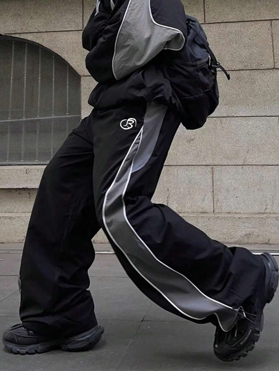 Pantalones de pierna recta y pierna ancha de moda para hombres, pantalones largos holgados con estampado de letras y diseño de parche personalizado para uso en exteriores