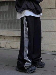 Pantalones de pierna recta y pierna ancha de moda para hombres, pantalones largos holgados con estampado de letras y diseño de parche personalizado para uso en exteriores