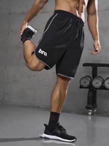 Pantalones cortos versátiles para hombre, diseño de dobladillo de secado rápido para maratón, gimnasio, baloncesto, entrenamiento de atletismo, ligeros para el verano - Negro - Ver 1