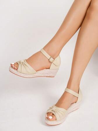 女士时尚草编蝴蝶结透气休闲度假厚底坡跟凉鞋