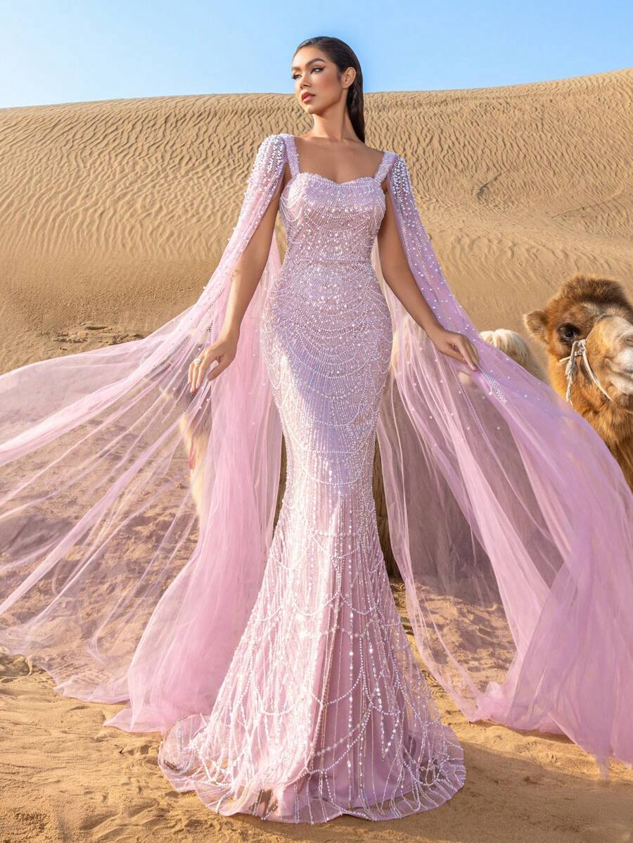 Faeriesty 优雅华丽的珠饰亮片晚礼服，饰以仿珍珠披肩袖，美人鱼廓形，曳地长拖尾，适合红毯活动、奢华婚礼、盛大晚宴、艺术画廊开幕式派对等正式场合，亦是春假度假的理想之选。