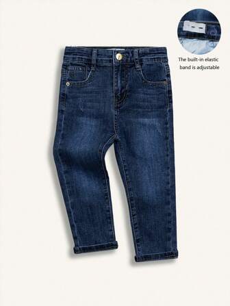 Vaqueros casuales cómodos de denim azul claro con lavado desgastado y elástico, de moda para niños