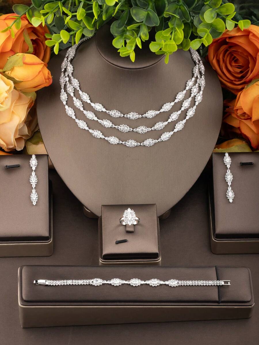 1 طقم إكسسوارات فاخرة أنيقة مرصع بالزركونيا مكون من 3 طبقات بتصميم زهري، يتضمن 1 زوج أقراط، 1 قلادة، 1 سوار، 1 خاتم، مناسب للزفاف ولارتداء في المناسبات (بدون علبة هدية)