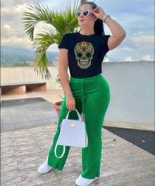 Black T-Shirt And Flared Pants Set For Women With SKULL COLORED DOTS Design