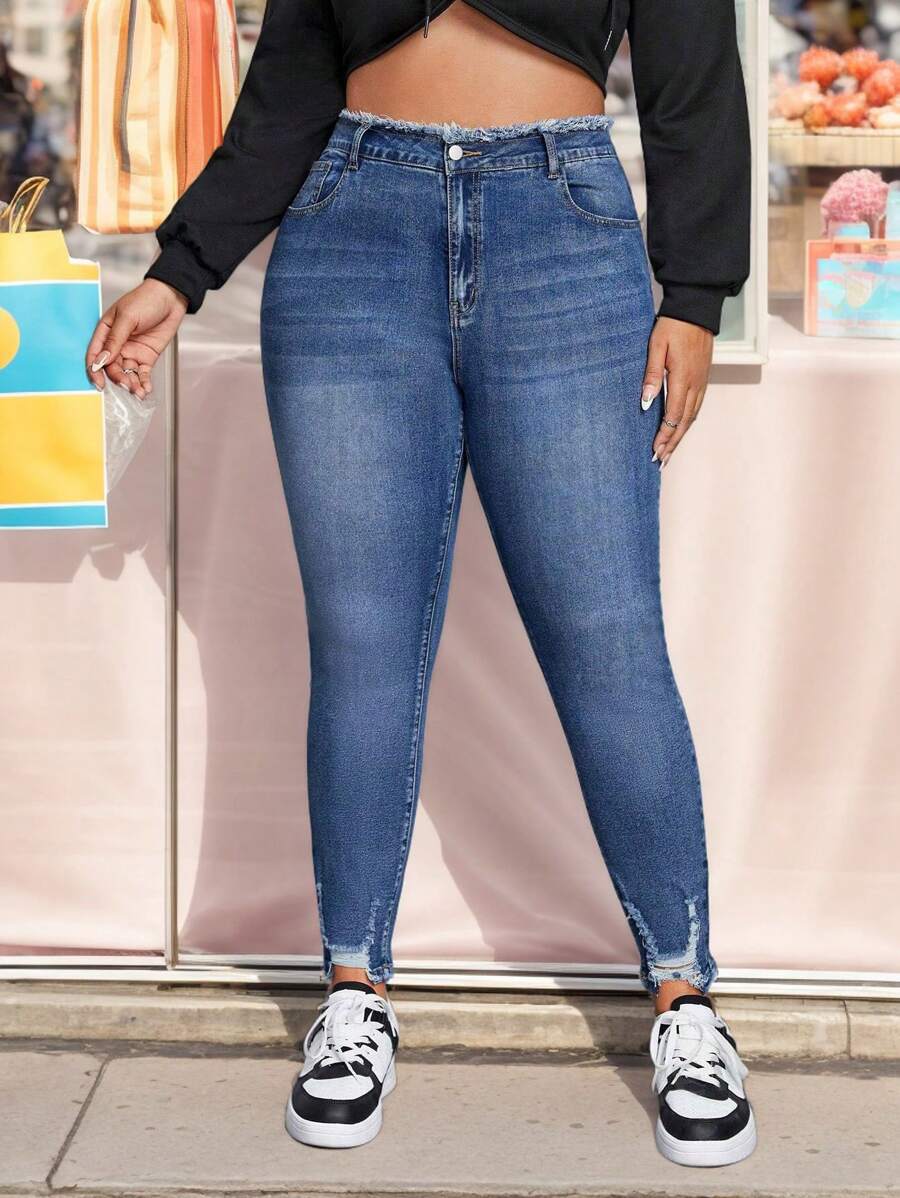 Talla grande Jeans ajustados desgarro, Jeans slim fit con diseño desgarrado y bolsillos sesgados, para tallas grandes, Pantalones Vaqueros De alle alto en azul con lavado claro De Talla Grande Con Patrón De Huella De Gato, Ultra Elásticos, Vaqueros elásticos con borde sin rematar en la cinturilla - Azul - Ver 1