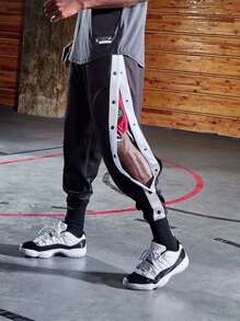 Pantaloncini da basket con bottoni laterali in stile americano, uomo, pantaloni sportivi per riscaldamento, vestibilità morbida e gamba affusolata, pantaloni da allenamento, streetwear - nero - Visualizzare 3