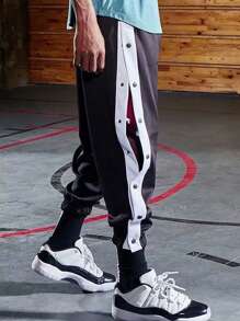 Pantaloncini da basket con bottoni laterali in stile americano, uomo, pantaloni sportivi per riscaldamento, vestibilità morbida e gamba affusolata, pantaloni da allenamento, streetwear - nero - Visualizzare 5