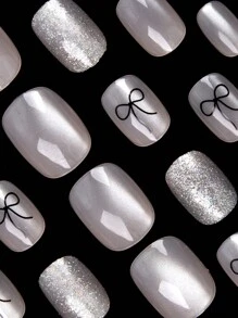Transform Your Nails With 24pcs Casual Elegant Street Simple Daily Black Bow Pattern Transparent Base Cat Eyes Bling Bling Small Short Oval Press On Nails Fake Nail Kit,Suitable For Girls And Women With Delicate Personalities To Use In Daily Life And Shopping