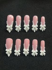 10 Pieces Of Pure Handmade Armor,Press On Nails,Nail Supplies,Nails Ptess On,Beach Essentials, 33mm Almond Shape, The Nail Piece With The Theme Of Pink, The Nail Piece Inlaid With White Three-Dimensional Bow Decoration, The Overall Simple And Generous, Suitable For Daily Leisure And Entertainment, Worn When Going Out On A Date, The Nail Piece Is Convenient To Wear And Can Be Worn Repeatedly.