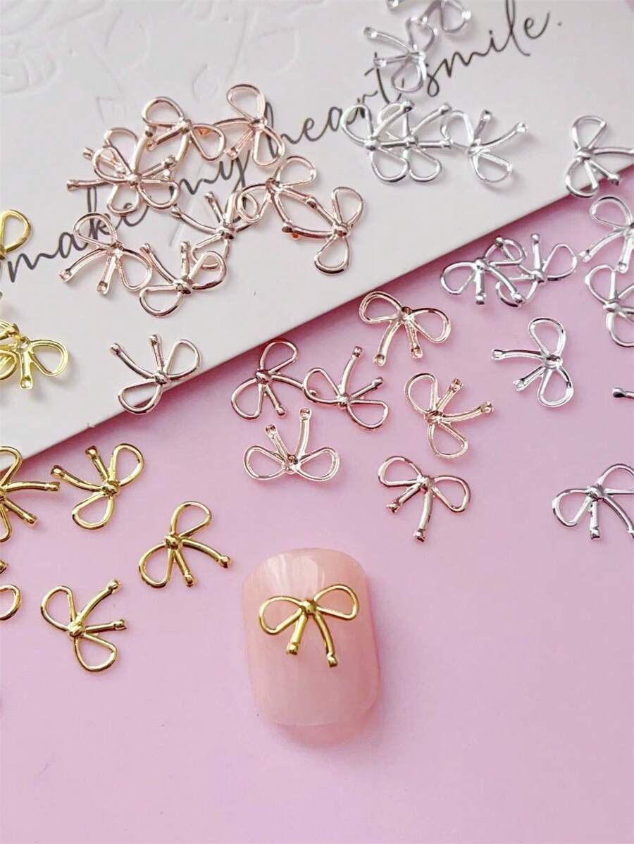 100pcs Nail Decoration, Copper Material, Rivets, Gold, Silver, Rose Gold, 3D Ribbon Bowknot Shape, Suitable For Nail Art Creation, Cute Style, DIY Decorative Accessories, Matte, Shiny Nails, Long Nails, Short Nails, Almond Nails, Ballet Nails, French Pointed Nails Are All Suitable Nails Charms Nails Supplies