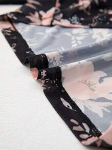Acelitt Zwarte bloemen mesh coltrui lange mouwen aansluitende blouse