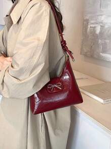 Bolso bandolera de mujer con decoración de lazo, de unicolor simple en PU, con forma de media luna. Un regalo de San Valentín perfecto