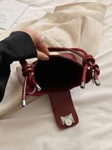Bolso bandolera de mujer con decoración de lazo, de unicolor simple en PU, con forma de media luna. Un regalo de San Valentín perfecto