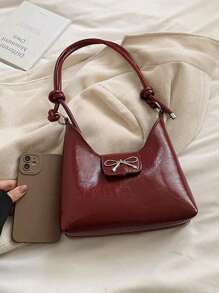 Bolso bandolera de mujer con decoración de lazo, de unicolor simple en PU, con forma de media luna. Un regalo de San Valentín perfecto