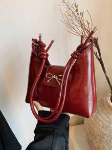 Bolso bandolera de mujer con decoración de lazo, de unicolor simple en PU, con forma de media luna. Un regalo de San Valentín perfecto