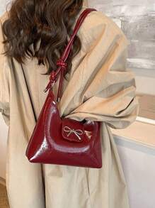 Bolso bandolera de mujer con decoración de lazo, de unicolor simple en PU, con forma de media luna. Un regalo de San Valentín perfecto