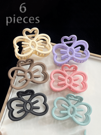 1/3个可爱镂空猫咪蝴蝶结发夹，适合任何发质和场合，是节日、旅行、送给女性的绝佳礼物，也是美发用品和圣诞袜填充物的理想之选。