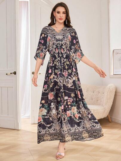 Damen Kleid mit V-Ausschnitt, halblangen Ärmeln und geraffter Taille mit Muster