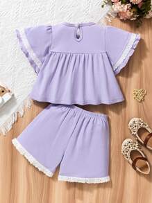 2 pezzi set da bambina composto da top a maniche corte con arricciature a tinta unita e pantaloncini larghi