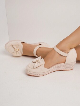 女士时尚杏色亚麻绳休闲度假坡跟凉鞋