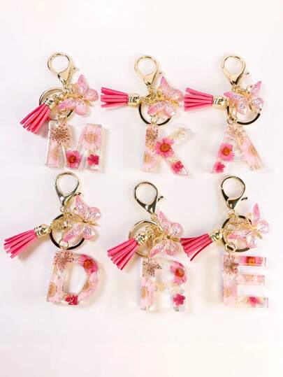 1 Stück Schlüsselanhänger für Frauen mit Tropfen, Silikon, Herz-Form, Quaste, kreatives Taschenaccessoire, geeignet als Geschenk für Freundinnen, Schlüsselanhänger mit kristallenen Blumen und Buchstaben, geeignet als Geschenk, Schlüsselanhänger mit Buchstaben-Initiale, süße Schmetterling Schlüsselanhänger Ring, Tasche, Rucksack Charm, Kopfhörer Etui Abdeckung Accessoires, Geschenk für Frauen