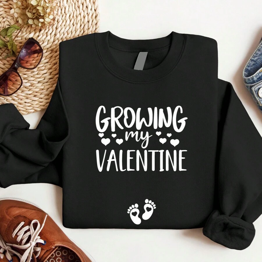 Valentine Pregnancy Announcement Sweatshirt, Growing My Valentine Sweatshirt, Baby Feet Heart Sweater, Maternity Sweatshirt, February Gender Reveal Sweatshirt, Baby Shower Gift. UA-847 - Black - View 1
