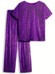 夏季女士派对套装，纯色圆领短袖上衣和裤子，带口袋的华丽时尚亮片裤子。女士夏装，商务休闲女士