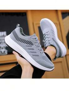 Zapatos deportivos vintage multicolores cómodos y casuales para hombre con azul oscuro y marrónHombres Zapatillas deportivas de color combinado con cordón delantero patinar deportivoZapatos deportivos de running informales, cómodos y transpirables al aire libre para hombre. Diseño de bloques de color blanco y negro sencillo y de moda - Gris - Ver 9