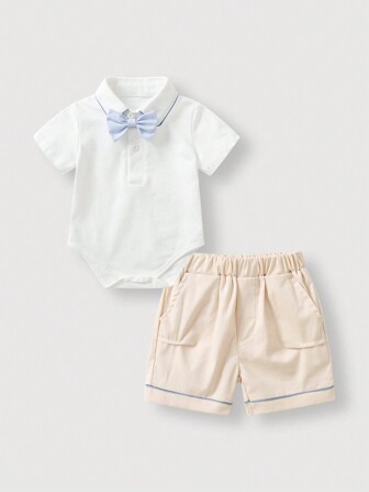 Conjunto casual de bebé niño con top de manga corta con botones delanteros y pantalones cortos minimalista