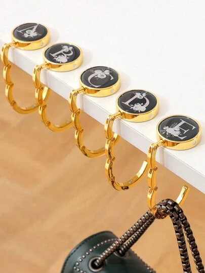 1 conjunto de cabide de carteira dobrável com iniciais, design de letras florais, suporte de carteira de metal para mesa, gancho de bolsa moderno e organizador de mesa de escritório feminino, ganchos adesivos, cabide de toalhas, decoração de parede para quarto, cabides, ganchos, cabide, volta às aulas, prateleiras, organização e armazenamento, porta-chaves, porta-chaves de parede, cabide de chaves, gancho para adesivos, cabide de porta, decoração de quarto, acessórios de cozinha