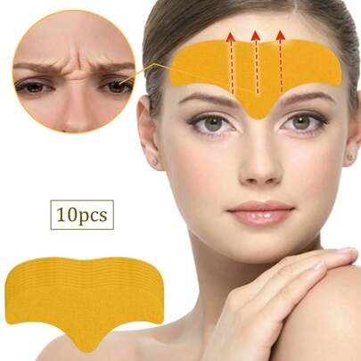 10 piezas/Paquete Parches suavizantes para la frente de color amarillo, adecuados para arrugas, con ingredientes herbales chinos suaves, no irritantes