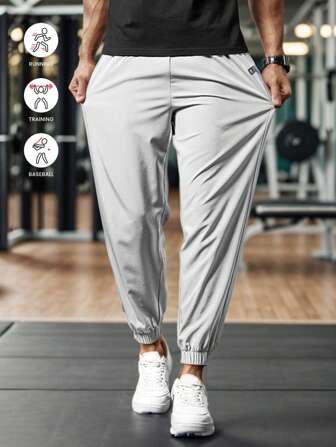Men's Sports Trousers With Elastic Cuffs, Fabric That Is Lightweight, Breathable, And Has A Sense Of Drape With Stretch, A Silhouette That Slims And Elongates The Legs, Suitable For Sports, Fitness, Running, Playing Ball, And Outdoor Leisure Wear