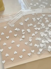 10 Stück kreative transparente herzförmige selbstklebende Verpackungstüten für Kekse, Süßigkeiten und Desserts, geeignet für Geschenke und Verpackungen, ideal für den Valentinstag, Hochzeiten und andere Feierlichkeiten
