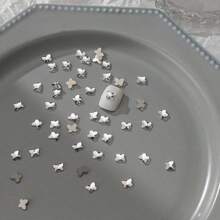 50 件/包美甲扁平不对称形状水钻装饰，包括白色闪光心形、蝴蝶形、星星形、水滴形、斜心形玻璃水钻美甲用品指甲饰品美甲宝石