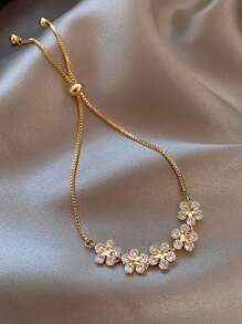 1 pezzo Braccialetto regolabile con 5 fiori decorativi e strass, catena in metallo dorato, adatto per uso quotidiano delle donne, regalo di San Valentino (materiale in lega, maneggiare con cura, evitare di tirare eccessivamente)
