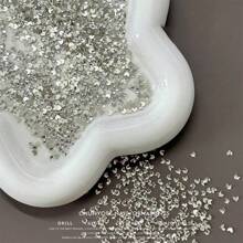 50 件/包美甲扁平不对称形状水钻装饰，包括白色闪光心形、蝴蝶形、星星形、水滴形、斜心形玻璃水钻美甲用品指甲饰品美甲宝石