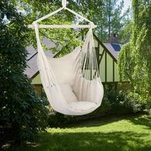 Outdoor Comfort Redefined: Beige Cotton Canvas Swing Chair With Cushions
