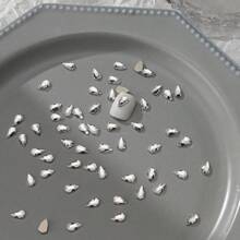 50 件/包美甲扁平不对称形状水钻装饰，包括白色闪光心形、蝴蝶形、星星形、水滴形、斜心形玻璃水钻美甲用品指甲饰品美甲宝石