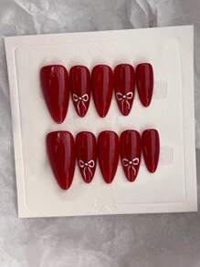 10片手工美甲贴片，杏仁形红色美甲贴片，手绘蝴蝶结美甲贴片，Y2K风格美甲贴片，简约甜美美甲，按压式假指甲，全覆盖美甲贴片，居家DIY美甲贴片，四季皆宜，适合女性旅行、派对、聚会、约会等场合，可拆卸可重复使用，日常办公美甲贴片，可佩戴美甲贴片。节日美甲美甲用品，手工按压式美甲贴片。 - 彩色 - 查看 3