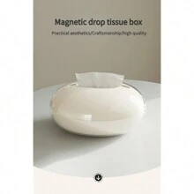 Une boîte à mouchoirs en art magnétique créative, boîte à papier de table de salon haut de gamme simple en forme de goutte d'eau, support à mouchoirs circulaire magnétique pour personnes âgées, pièces de décoration élégantes pour la maison, rangement pour mouchoirs en forme de goutte d'eau, décoration de salle de bain, organisateur de salle de bain pour l'été
