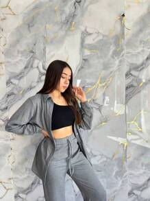 Set de 2 piezas de Chaqueta con botones frontales sólida y pantalones de pierna ancha tela acanalada con detalle de cordon frontal en cintura corte ligeramente holgado y camisa corte semi largo