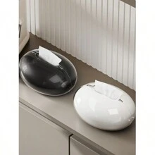 Une boîte à mouchoirs en art magnétique créative, boîte à papier de table de salon haut de gamme simple en forme de goutte d'eau, support à mouchoirs circulaire magnétique pour personnes âgées, pièces de décoration élégantes pour la maison, rangement pour mouchoirs en forme de goutte d'eau, décoration de salle de bain, organisateur de salle de bain pour l'été