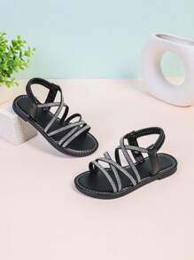 1 pereche Sandale plate cu decor cu strasuri strălucitoare și negre pentru copii/fete, curea elastică din PU, vârf închis, anti-alunecare Casual, stil roman drăguț, potrivite pentru 3-15 ani, zilnic, petrecere, vacanță