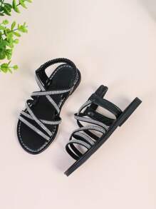 1 pereche Sandale plate cu decor cu strasuri strălucitoare și negre pentru copii/fete, curea elastică din PU, vârf închis, anti-alunecare Casual, stil roman drăguț, potrivite pentru 3-15 ani, zilnic, petrecere, vacanță