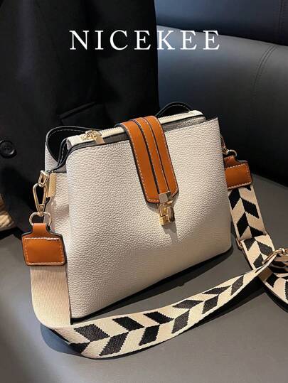 Fashionabla och mångsidiga Crossbody-väska i retrostil, nischdesign, enfärgad, enkel och lätt, justerbar axelremsväska, geometrisk axelremsväska, lämplig för arbete, pendling, gå ut, dejta, shoppa och ge presenter.