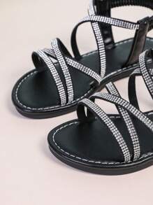 1 pereche Sandale plate cu decor cu strasuri strălucitoare și negre pentru copii/fete, curea elastică din PU, vârf închis, anti-alunecare Casual, stil roman drăguț, potrivite pentru 3-15 ani, zilnic, petrecere, vacanță