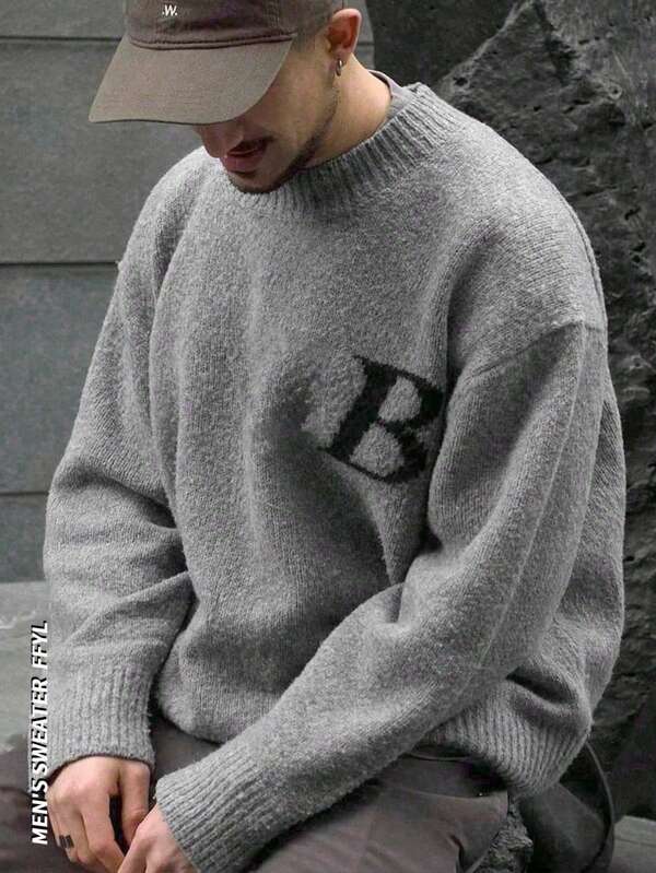 Suéter de tricô casual oversized, unissex, design moderno, modelagem solta, ideal para outono/inverno, pulôver minimalista com gola redonda e estampa de texto em inglês.